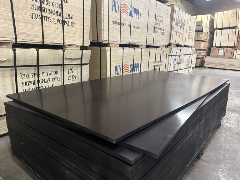 Form plywood sheets stacked in warehouse – 18mm film faced plywood for concrete formwork, Ply Supply Canada